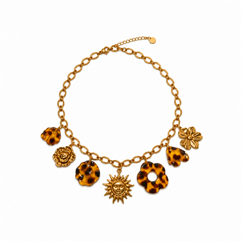 Collier doré à pampilles soleil et effet écaille
